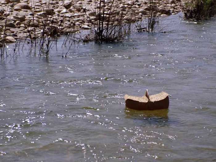 The film begins with a woven basket floating down a river, evoking the Biblical story of Moses.