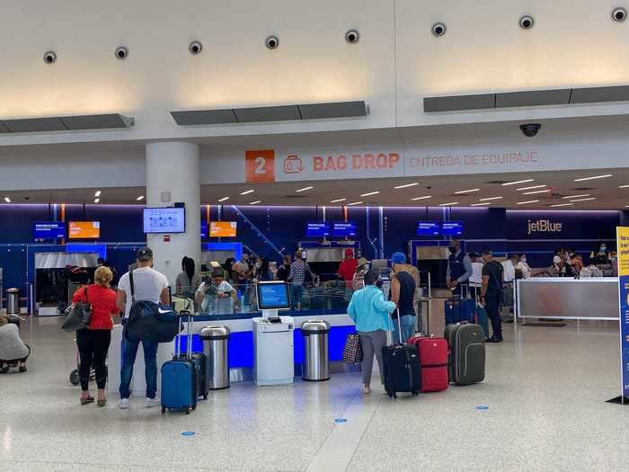 Kiosks had been blocked here as well with the only log jams being at the bag drop, where lines had formed with less than six feet of distancing between travelers.