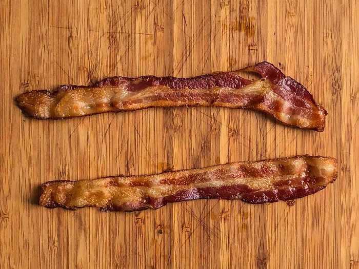 Making the bacon in the oven without parchment paper seemed to help it cook more quickly, but it also left me with drier strips.