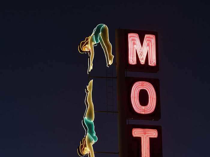 While signs are unique to each business, Barnes noticed themes across signs in the US and Canada, such as the use of diving ladies and mermaids to represent motels with swimming pools.