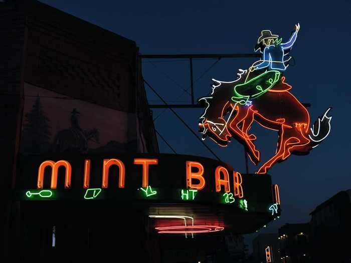 About one-third of the signs he photographed he found after arriving in a city, like the Mint Bar in Sheridan, Wyoming.