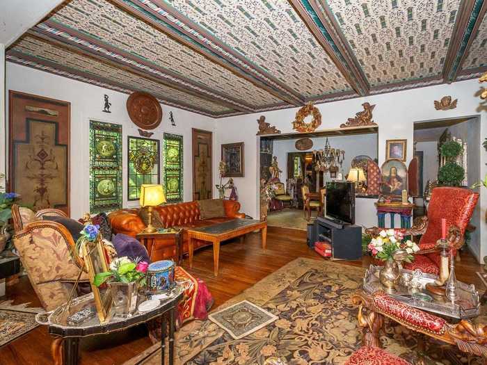 Combined with a whimsical 1,869-square-foot interior rich in antiques, the home looks like something out of "The Hobbit."