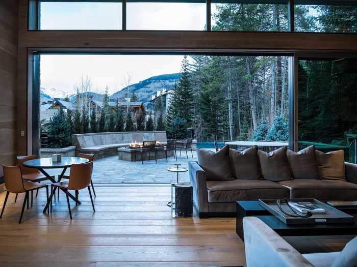 Both homes inspire indoor and outdoor living, with easy access to the expansive deck through wall-to-wall window doors.