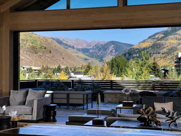 Both homes have open layouts and sweeping views of the mountains.