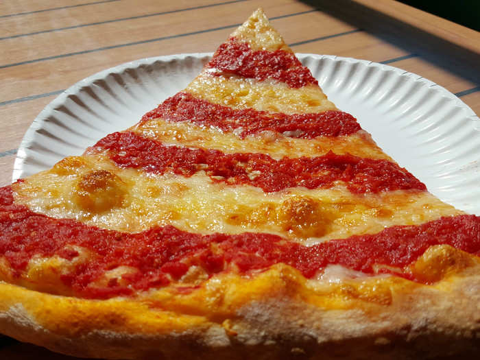 Although common throughout the US, it is rare to get a plain, single slice of pizza in Italy.