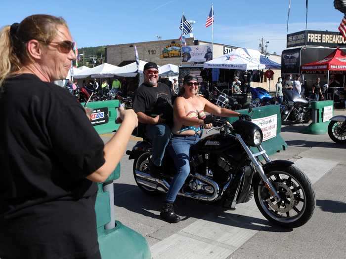 Bikers felt the breeze as they rode around the city, some of them topless.