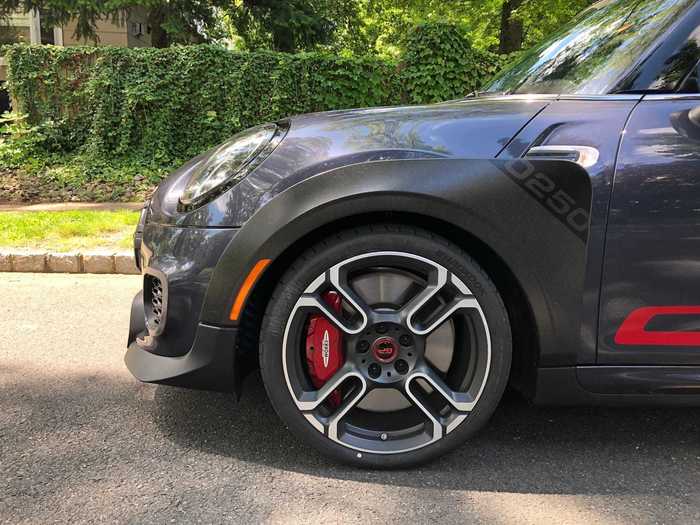 Four-piston aluminum brake calipers clamp down on ventilated front rotors.