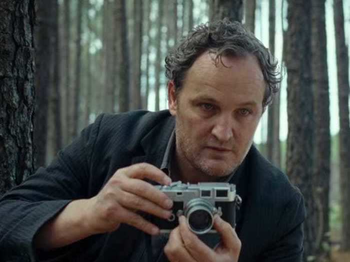 Jason Clarke plays Carl Henderson, an out-of-work photographer who kills people with his wife, Sandy.