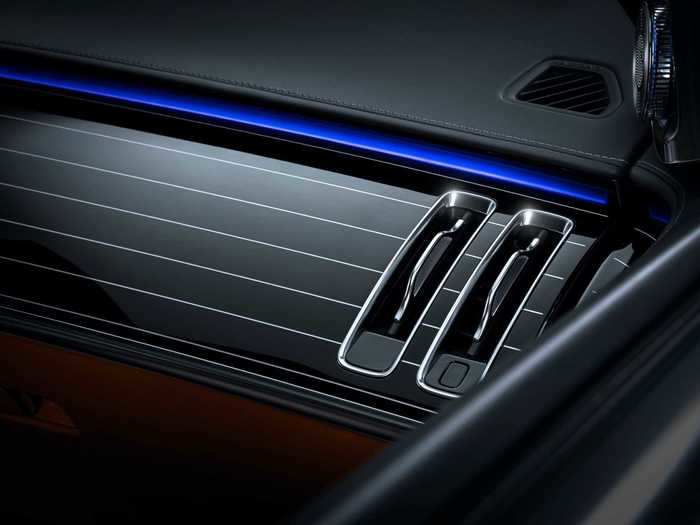 There will be open-pore wood veneers and real aluminum inlays. These vertical side-vents help round off the dashboard.