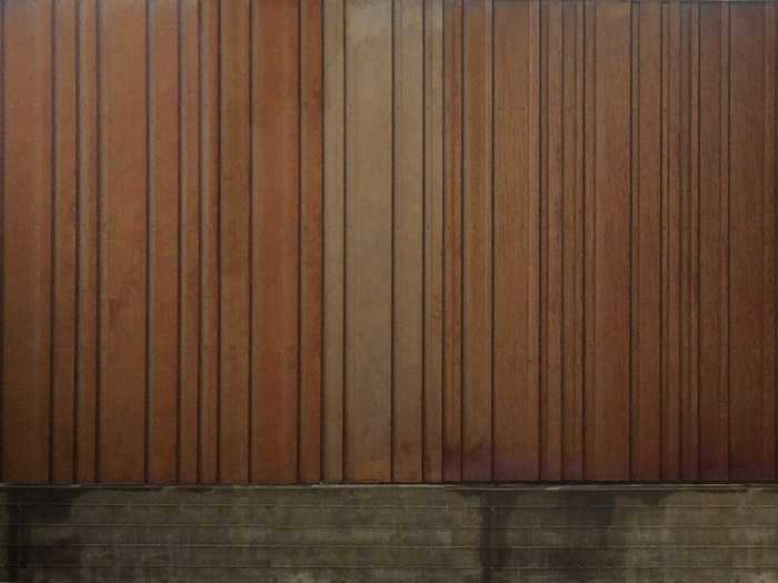 Both buildings have weathering steel siding.