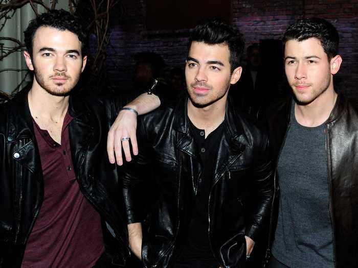 The three brothers rocked leather jackets while sitting in the front row at a New York Fashion Week show in January 2018.