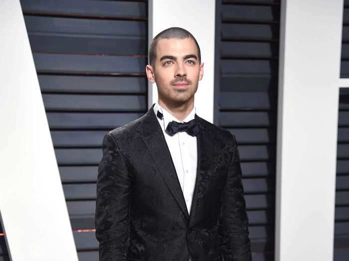 And then he went back to a buzz cut, as seen at the 2017 Vanity Fair Oscars Party.