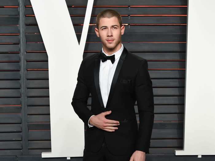 Nick Jonas stepped out with a buzz cut at the Vanity Fair Oscars Party in February 2016.