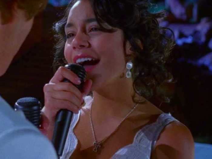 Gabriella is somehow wearing her "T" necklace again during "Everyday."