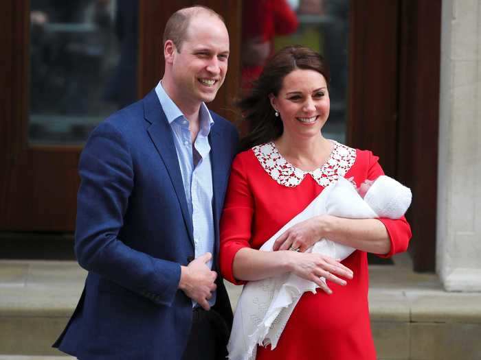 After the birth of Prince Louis, Middleton wore yet another Jenny Packham dress, this time red with a lace collar.