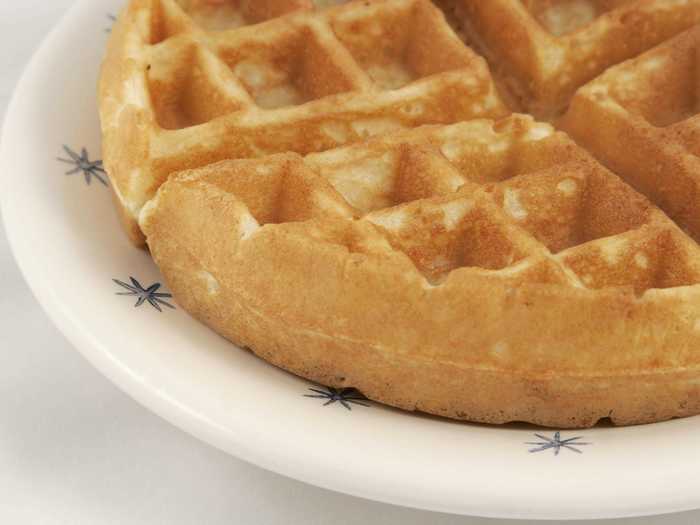 Sprinkle water on your waffles before cooking them in the oven.