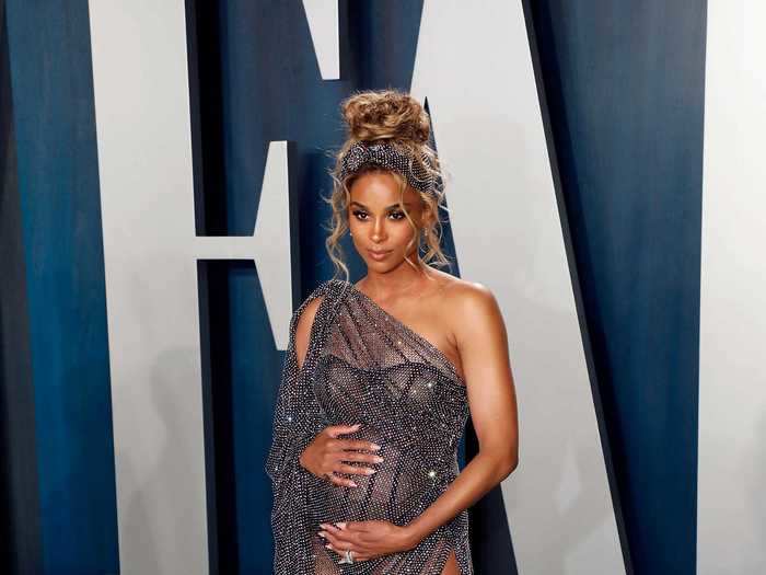 Ciara showed off her growing baby bump in a see-through custom Ralph & Russo gown at the Vanity Fair 2020 Oscars after-party in February.