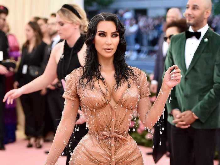 At the same event, Kim Kardashian West wore a form-fitting Thierry Mugler dress that had a sheer effect.