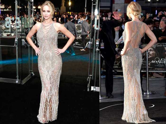 Jennifer Lawrence wore a silver Atelier Versace dress covered in a cobweb-like design at the London premiere of "mother!" in September 2017.