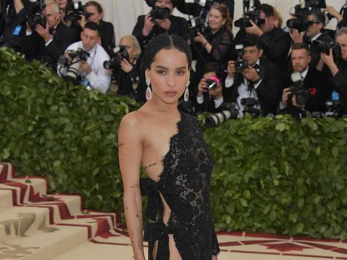 Zoë Kravitz wore a lace Saint Laurent dress held together by two bows to attend the Met Gala in early May 2018.