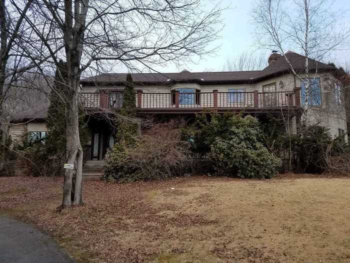 Two empty nesters bought an abandoned farm and turned the main house into a luxury home.