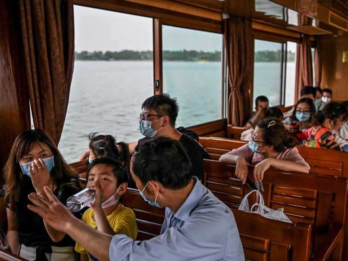 Residents began riding the tourist ferry on Wuhan