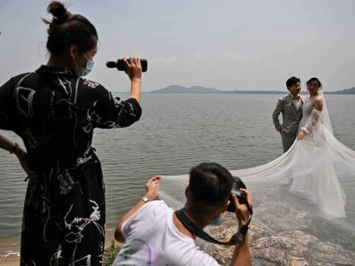 After lockdown end, couples whose weddings were delayed by the pandemic rushed to get married.