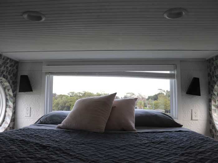 The bedroom was located above the bathroom in a loft.