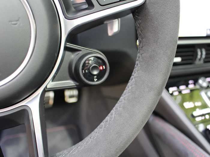 A steering-wheel-mounted selector enables you to switch drive modes: Comfort, Sport, Sport +, and Individual.