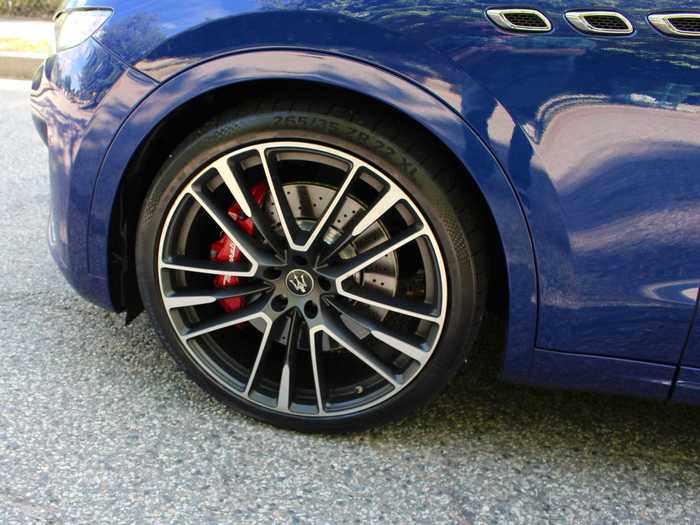 The 22-inch wheels cost an extra $4,000. The three-season tires added another $400. The red brake calipers came gratis!