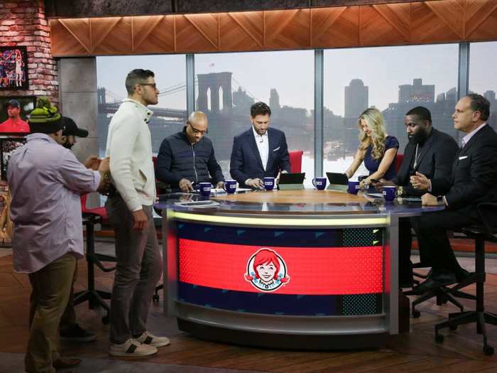 Everyone got situated around the desk to kick off the show.