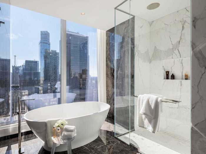 In the master bathroom is both a freestanding soaking tub and a walk-in shower.