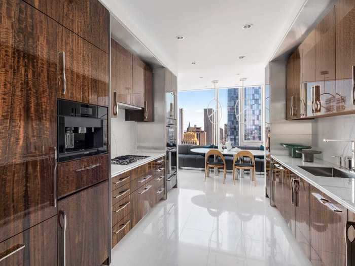 The kitchen features custom cabinetry from Smallbone.