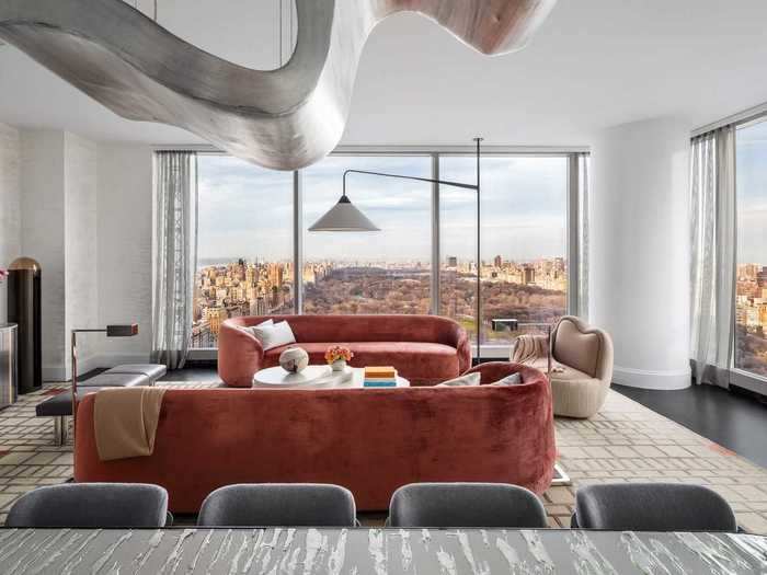 The room was designed to maximize the views of Central Park from the seating areas and from the dining table.