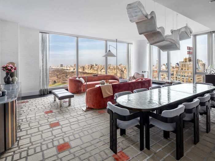 The grand salon has floor-to-ceiling windows and wraparound views of the city and Central Park.