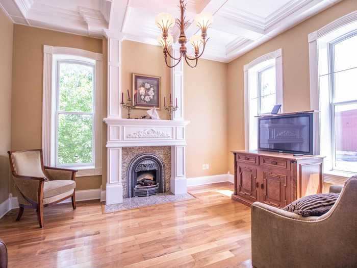 The first floor features an electric fireplace in the living room.