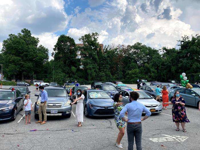 After a smattering of socially distant dancing and socializing, cars began lining up to leave the parking lot.