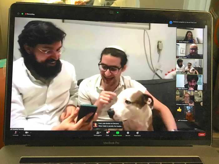 The night before the wedding, the grooms hosted a virtual tisch, a traditional Jewish reception with singing and speeches. Their dog, Booker, also joined the festivities.