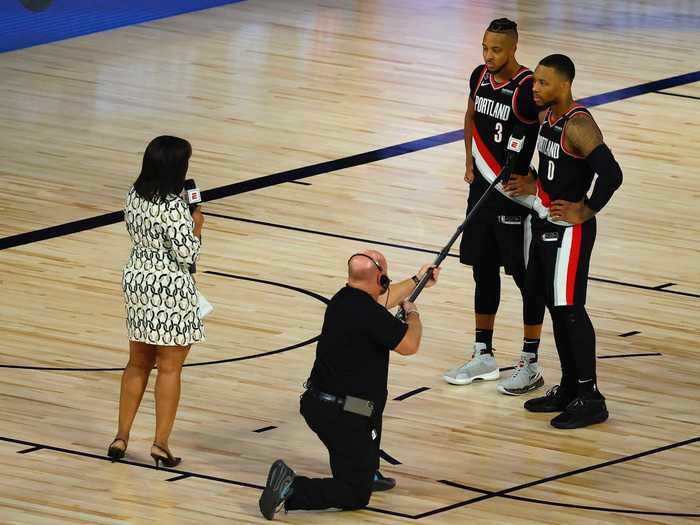 Oddly, post-game interviews are socially distanced as well.