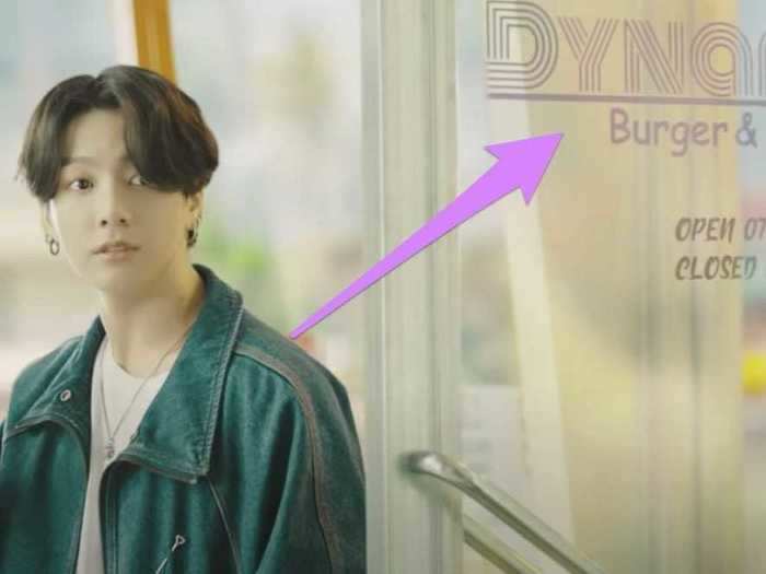 The burger and donut shop in the music video is called "Dynamite burger and donut."