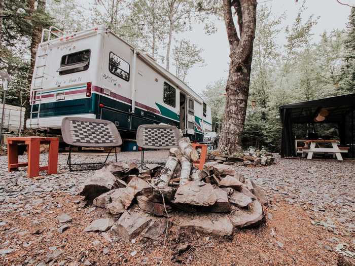 The outdoor space also features a fire pit.