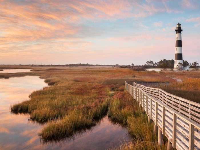 The Outer Banks in North Carolina are about three hours and 30 minutes from Raleigh, North Carolina.