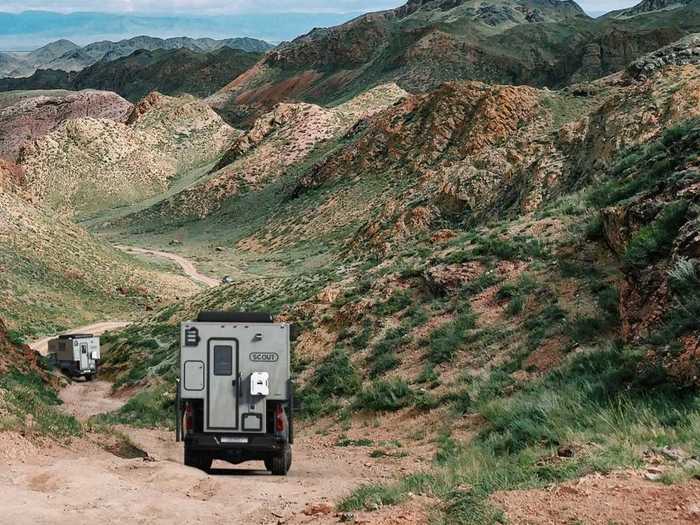 This curtain attaches to the ceiling of the camper, creating a temporary separated space to rinse off gear, people, and shoes after an outdoor trek.