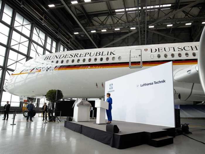 The aircraft is painted in the traditional German Air Force VIP livery, an all-white fuselage with a cheatline in the colors of the country