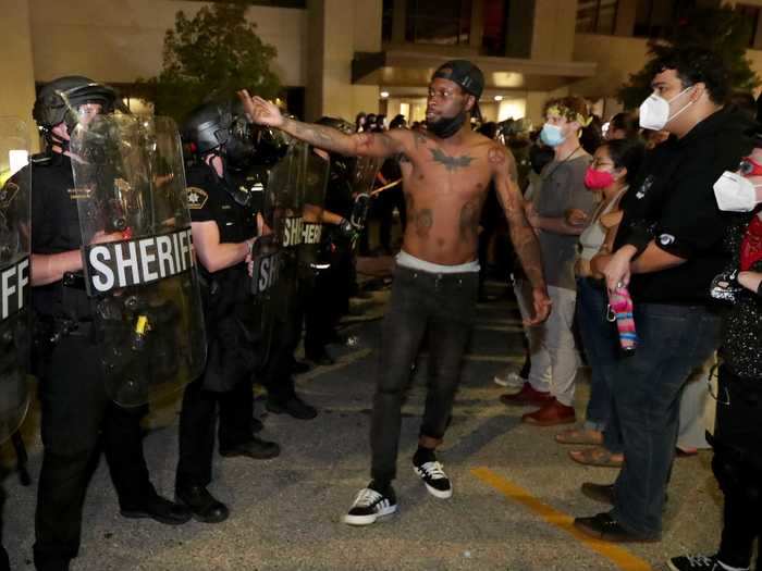 Many protesters were reportedly tear-gassed and stuck with rubber bullets as they were met by officers with plastic shields.