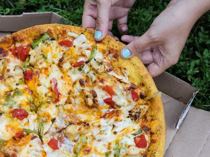 Our journey into darkness continued with the chicken taco pizza. Cain remarked that this was definitely stoner food.