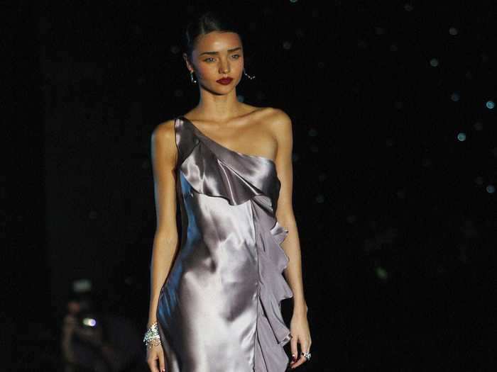 Miranda Kerr, pictured at Australian Fashion Week in 2004, also rose to prominence after becoming a Victoria