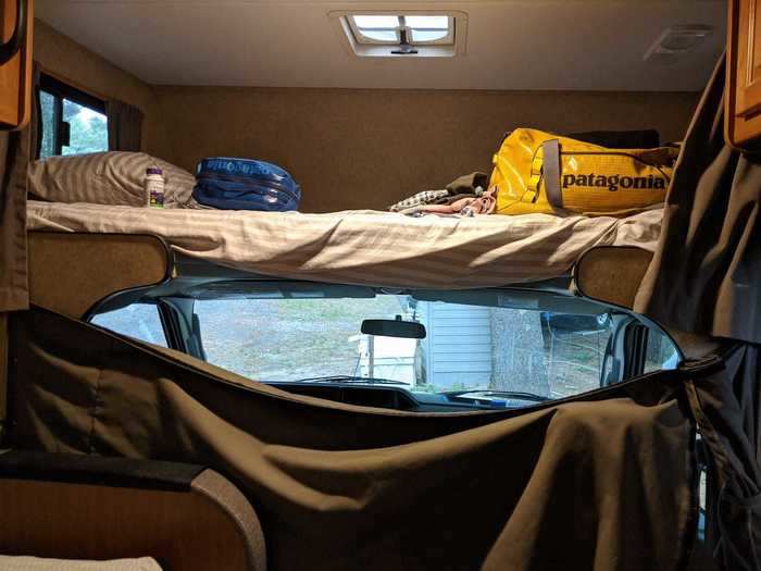 This divider curtain, I believe, was meant to shield the RV interior from view, but clearly didn