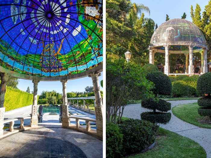 Bordering the pool is a stained-glass dome supported by stone columns.