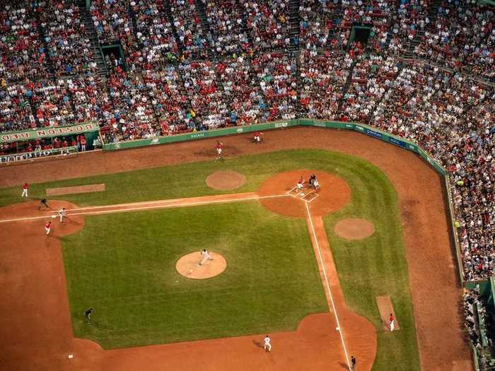 Fenway Park, the home of the Boston Red Sox, usually hosts around 35,000 fans per game.